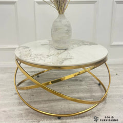 Stig Gold Round Coffee Table – Cream Sintered Stone Top with Sculptural Ring Frame