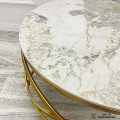 Stig Gold Round Coffee Table – Cream Sintered Stone Top with Sculptural Ring Frame